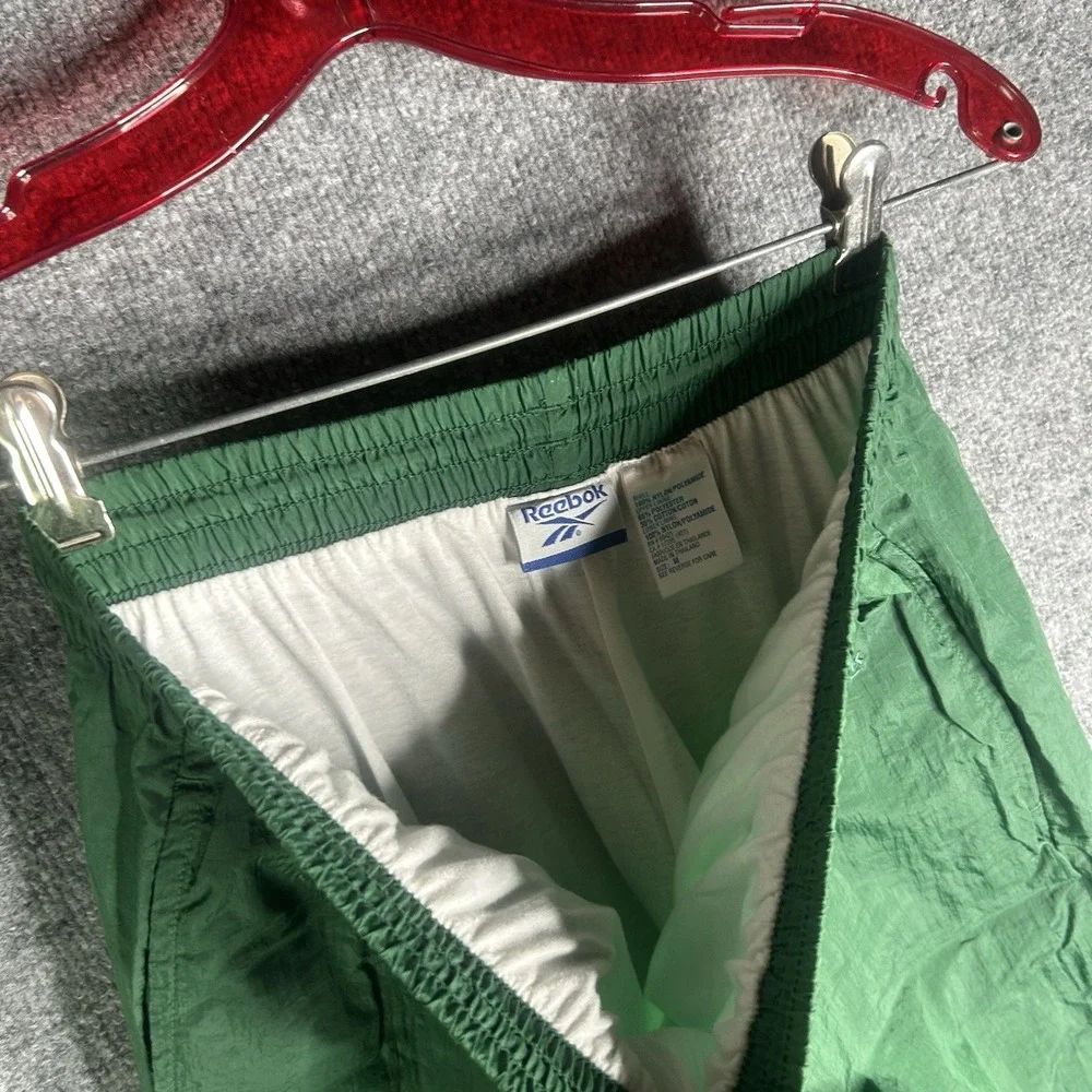 Vintage 90's Reebok Nylon‎ Track Pants Size Medium Green Logo Embroidered